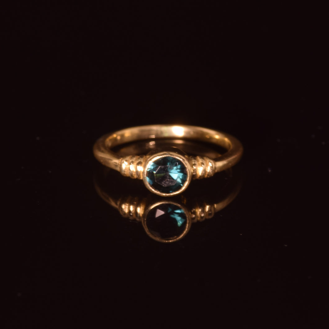 18K gold ring 5 mm bezel set faceted green tourmaline
